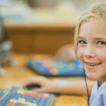 A Kid Enjoying Classroom Virtual Game Shows