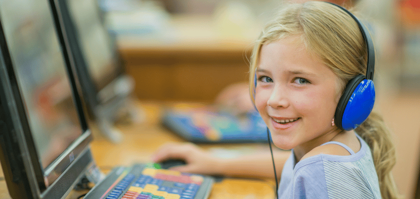 A Kid Enjoying Classroom Virtual Game Shows