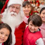 group of kids with santa claus
