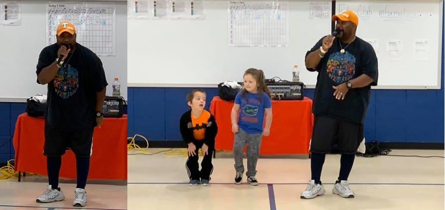 picture of man and two children getting ready to dance